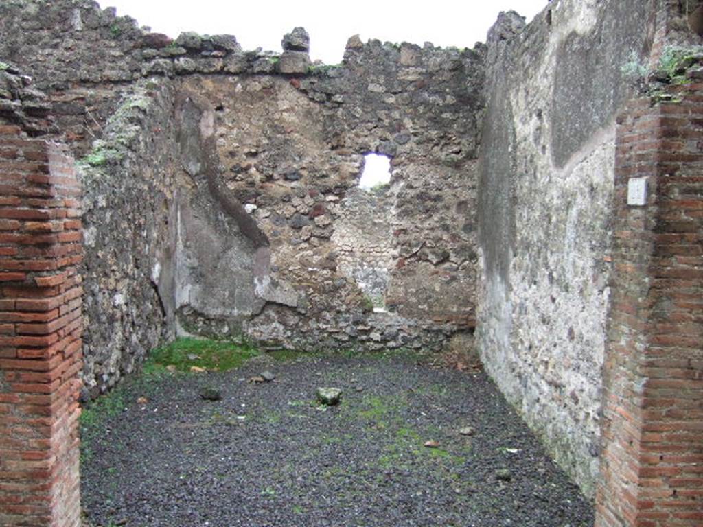 VII.13.22 Pompeii. December 2005. Looking east across entrance, at the rear on the right would have been steps to the upper floor.
