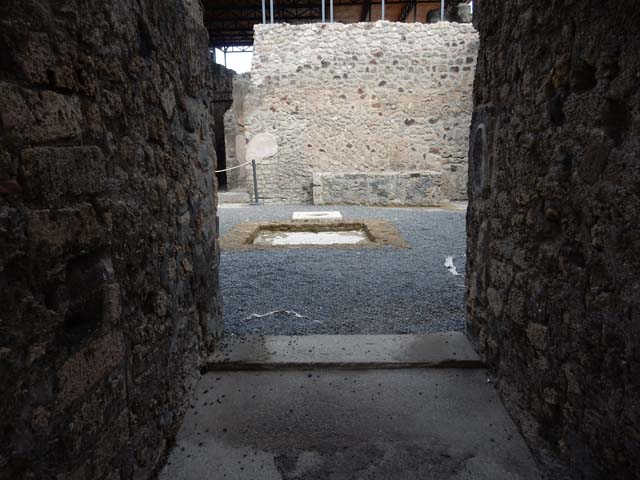 VII.15.1 Pompeii. May 2018. Looking south through doorway of cubiculum on east side of entrance. Photo courtesy of Buzz Ferebee. 
