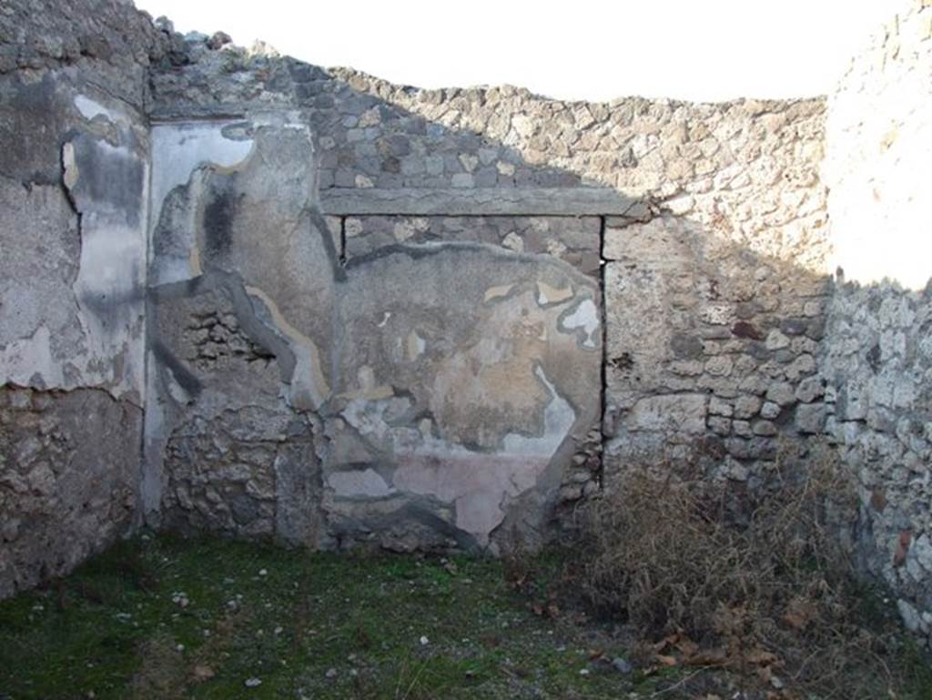 VII.15.13 Pompeii. December 2007. North wall of oecus on west side of entrance, with doorway blocked in antiquity.