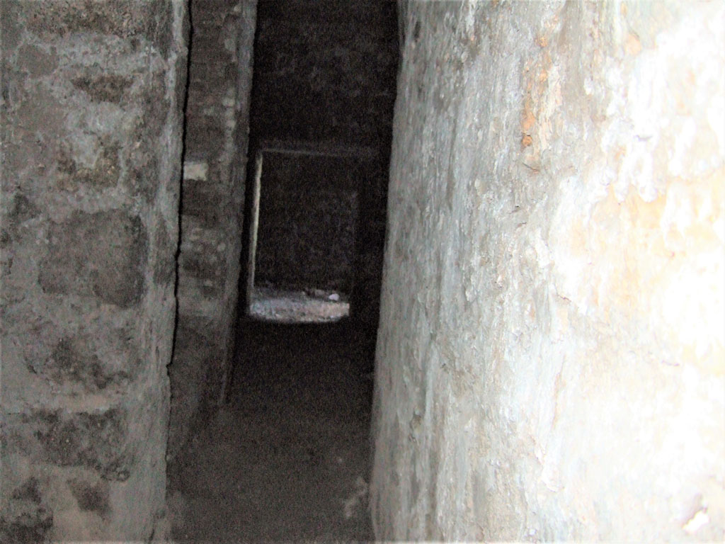 VII.15.16 Pompeii. May 2006. Granary. Looking west along corridor Y, and along to room Z. 