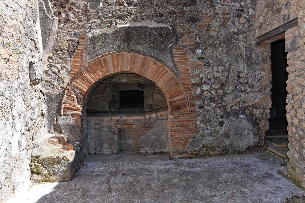 VII.15.16 Pompeii. April 2019. Looking east to granary oven located under the baths area of VII.15.2.
The doorway to room O is on the right. Photo courtesy of Nicolas Monteix.
