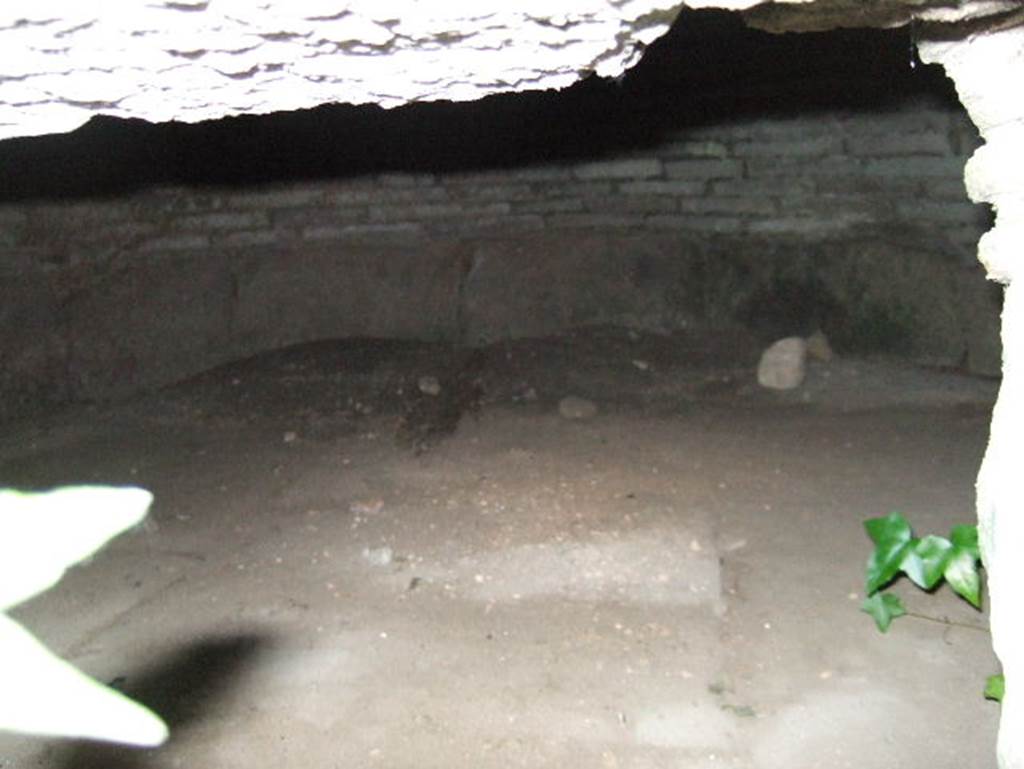 VII.15.16 Pompeii. May 2006. Granary, Room R, small doorway in east wall giving access to room S, a very low final room.  