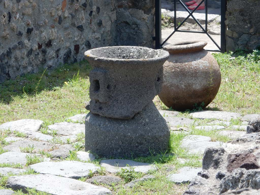 VII.16.6 Pompeii. June 2019. Looking south to remains of bakery machinery and dolium.
Photo courtesy of Buzz Ferebee.


