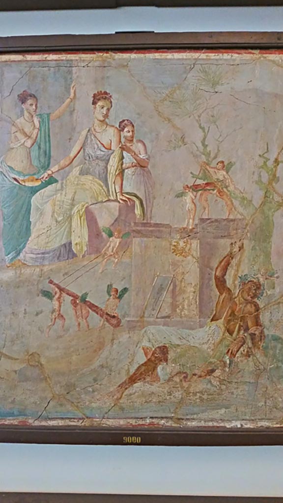 VII.16.10 Pompeii. Painting by Vincenzo Mollame of the wall of the oecus, with painting of Hercules and Omphale in the centre.
This was published by Niccolini in 1890 who describes it as being found 30 years previously in the Casa di Sirico.
However, the Hercules and Omphale painting is not identical to that in the Casa di Sirico which has more figures in its background.
The wall decoration is completely different from that in the Casa di Sirico which has more architectural features, yellow panels and an arabesque upper border. 
This Mollame painting corresponds with the painting by Abbate, ADS 805, the fresco MANN 9000, and the watercolour ADS 806, all from VII.16.10.
See Niccolini F, 1890. Le case ed i monumenti di Pompei: Volume Terzo. Napoli, L’Arte in Pompei, Tav. XXX. 
Our thanks to Justin Hicks for his help with this.

