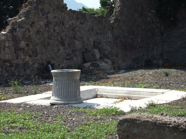 VII.16.10 Pompeii. June 2019. Puteal at west end of impluvium. Photo courtesy of Buzz Ferebee.