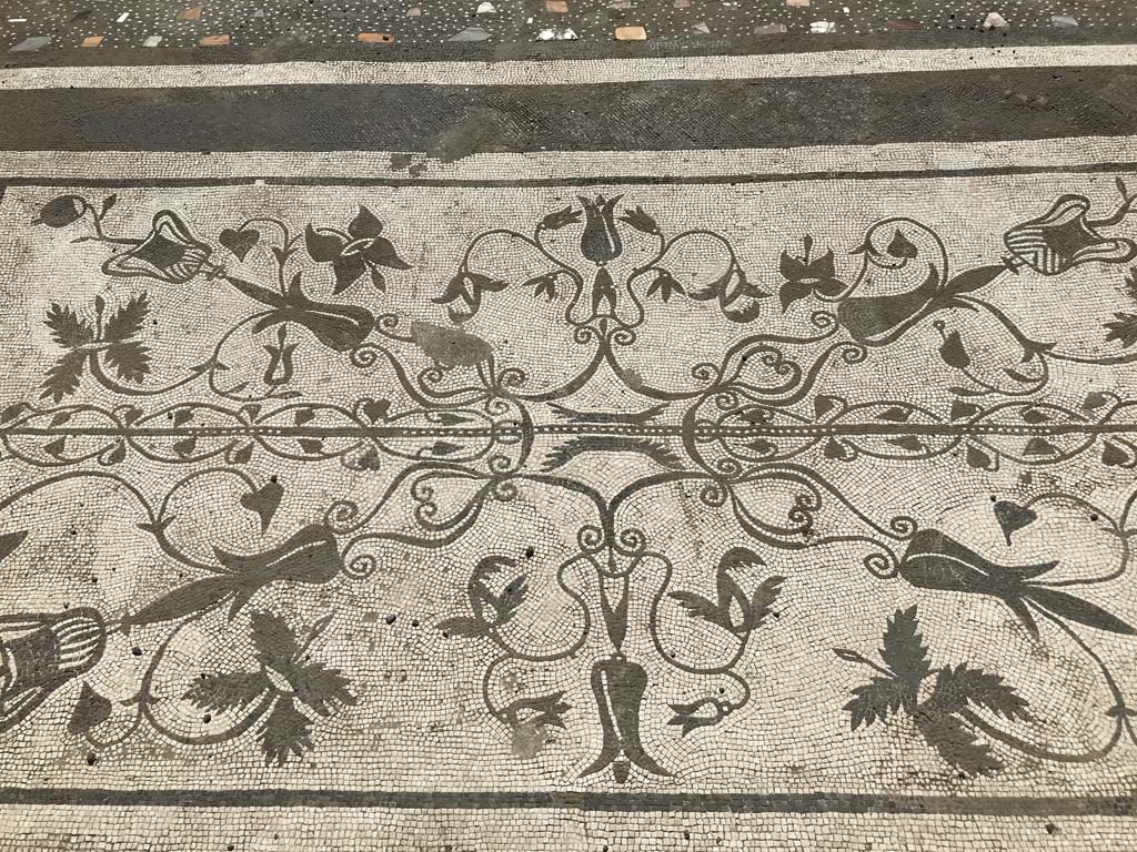 VII.16.13, Pompeii. December 2018. Entrance mosaic, looking west towards atrium flooring. Photo courtesy of Aude Durand.