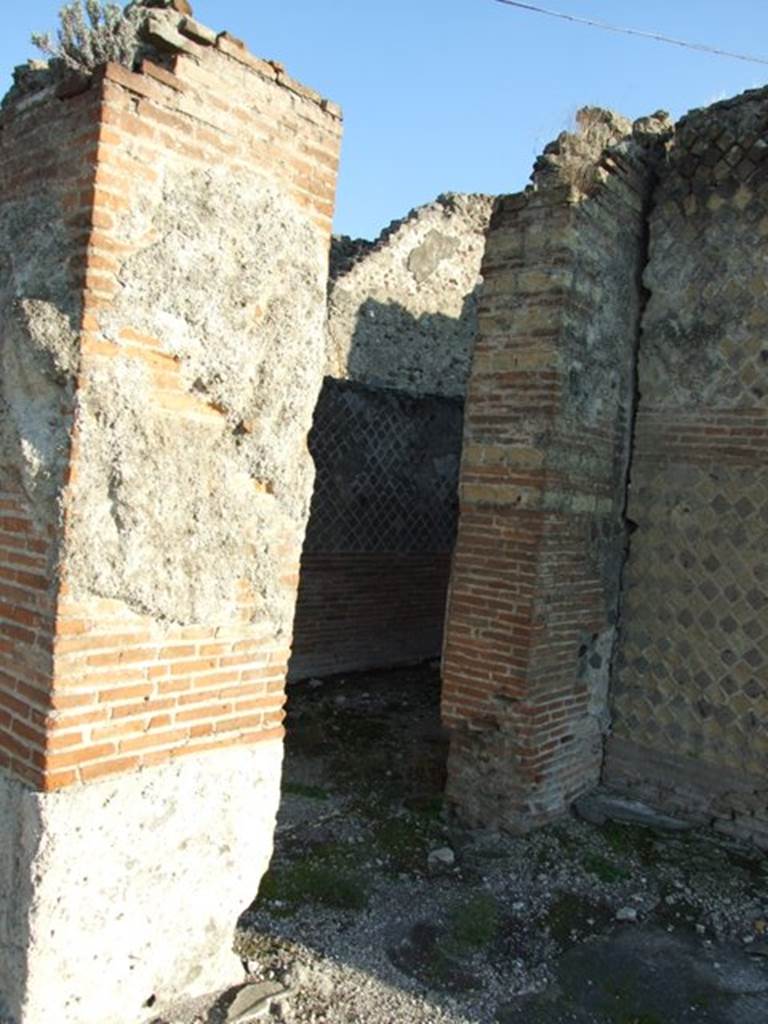 VII.16.15 Pompeii. December 2007. Doorway to room 13 on south side of entrance.