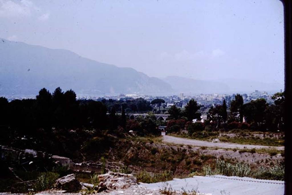 VII.16.17-22 Pompeii. 1964.  
View from the rear of House of Fabius Rufus, looking south-west across the Sarno plain. 
Photo by Stanley A. Jashemski.
Source: The Wilhelmina and Stanley A. Jashemski archive in the University of Maryland Library, Special Collections (See collection page) and made available under the Creative Commons Attribution-Non Commercial License v.4. See Licence and use details.
J64f2022
