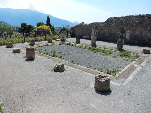VIII.2.3 Pompeii. May 2018. Looking north-east across rear of VIII.2.5, towards west wall of VIII.2.6 from north-east corner of peristyle. Photo courtesy of Buzz Ferebee.
