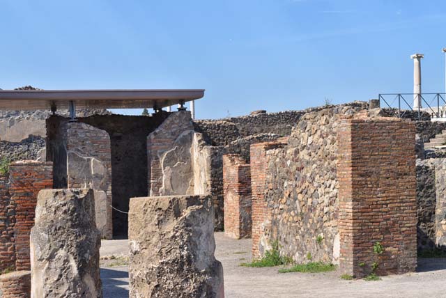 VIII.2.3 Pompeii. May 2018. Looking north-west from rear of VIII.2.5, across north portico of peristyle, at rear of tablinum. 
Photo courtesy of Buzz Ferebee.
