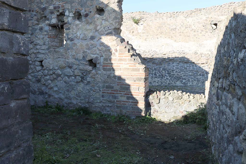 VIII.2.4, Pompeii. December 2018. Looking north towards blocked entrance doorway, from interior. Photo courtesy of Aude Durand.