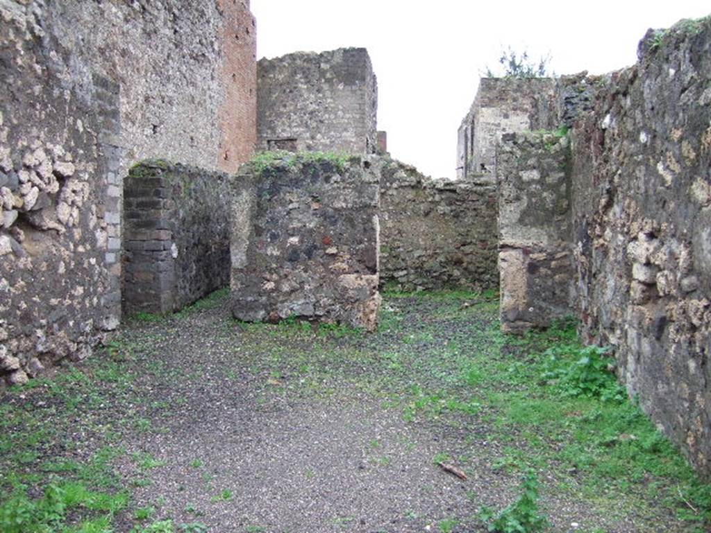 VIII.2.5 Pompeii. December 2005. Looking south to corridor to rear, and a doorway to a cubiculum, on the right.