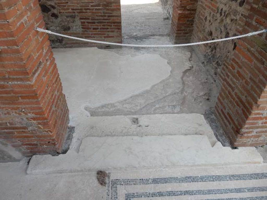 VIII.2.16 Pompeii. May 2018. Looking west across passageway and through another doorway to a room overlooking the east portico.  Photo courtesy of Buzz Ferebee.
