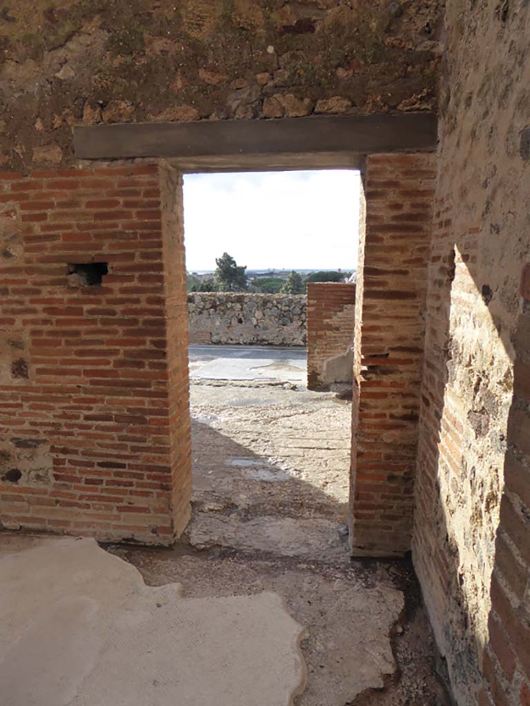 VIII.2.16 Pompeii. May 2018. Looking south along west wall in passageway. Photo courtesy of Buzz Ferebee.