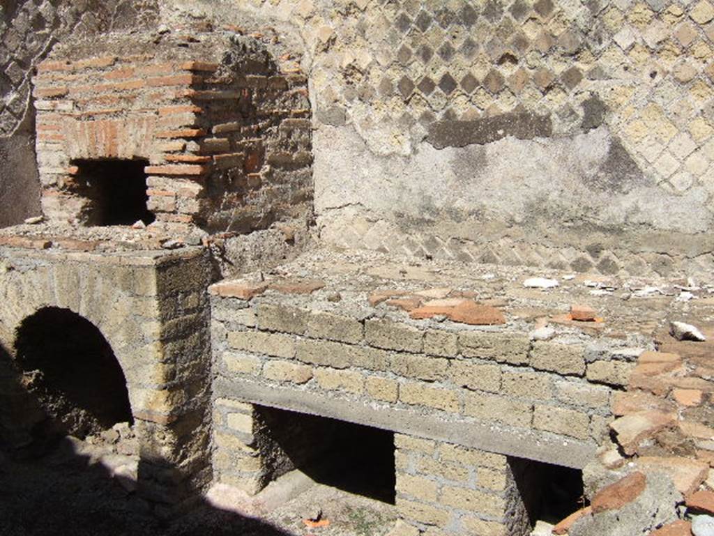 VIII.2.30 Pompeii. September 2005. Large hearth and small oven near north wall of kitchen.