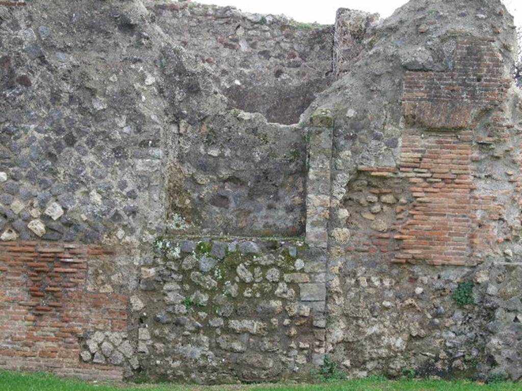 VIII.3.1 Pompeii. December 2006. Podium or platform with large niche on south wall.