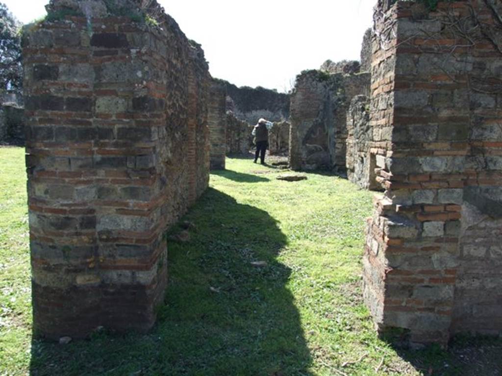 VIII.3.4 Pompeii.  March 2009.  Doorway to Room 10, Wide corridor leading to West Portico.


