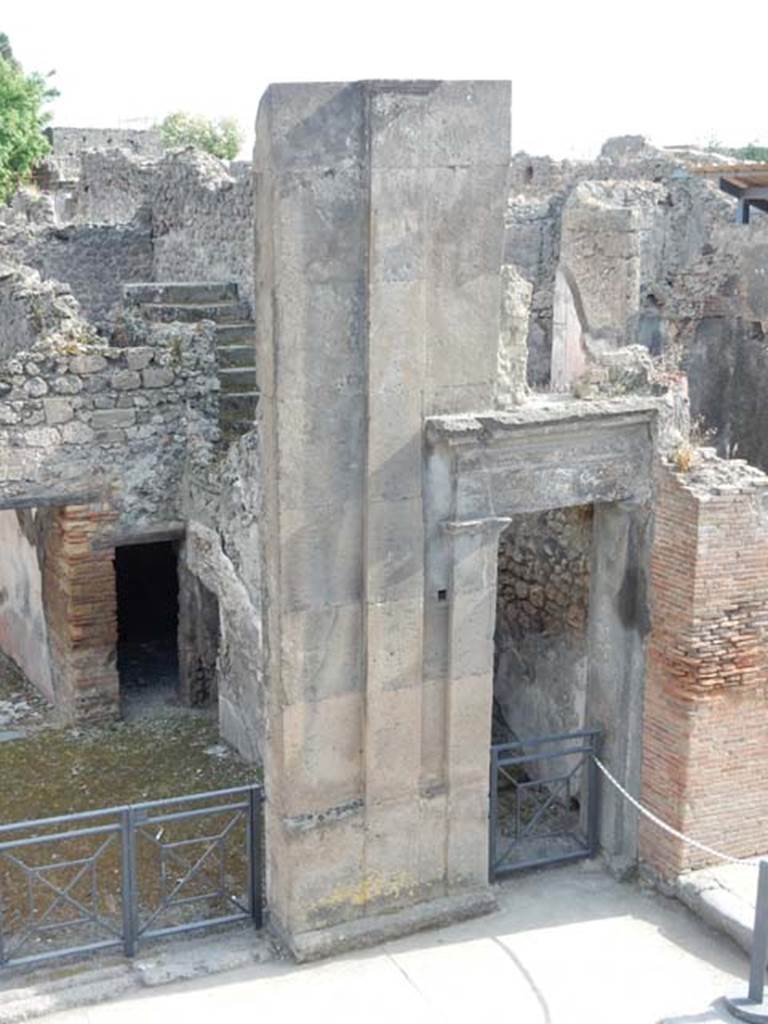 VIII.3.11 Pompeii, on left and VIII.3.10, on right. May 2015. Entrance doorway showing steps to upper floors at rear. 
Photo courtesy of Buzz Ferebee.

