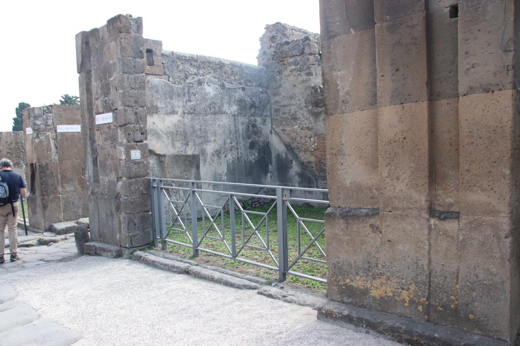 VIII.3.11, Pompeii., December 2018. 
Looking towards north-west corner with doorway to Via dell’Abbondanza, on right, and doorway to base of steps to upper floor in west wall, on left.  Photo courtesy of Aude Durand.
