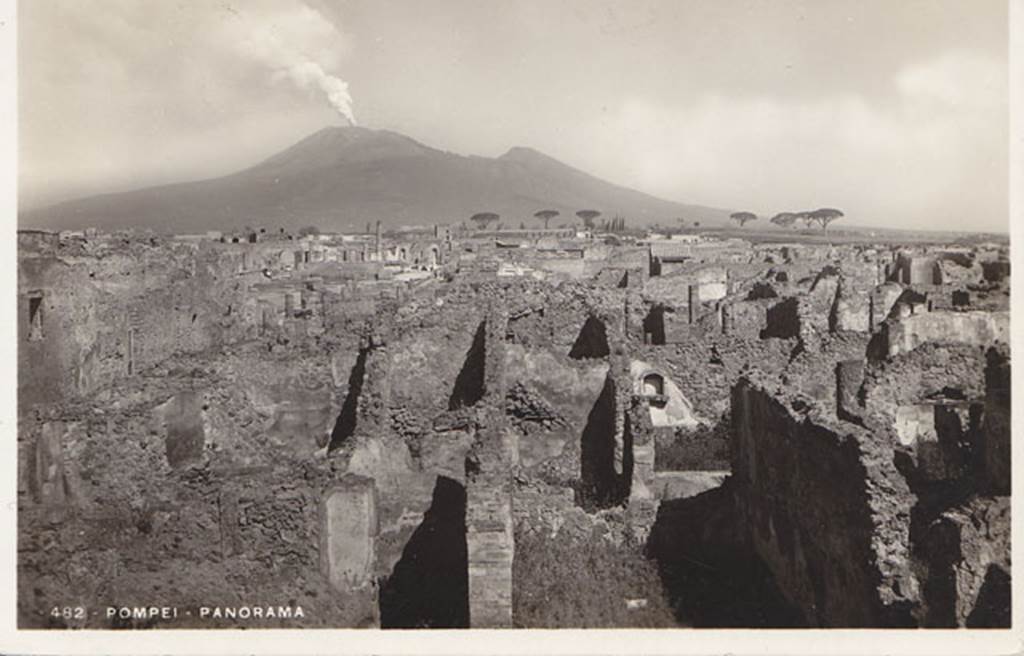 VIII.3.21 Pompeii. Postcard dated 1st August 1939. Looking north across VIII.3. VIII.3.21 can be seen at the front of the picture. 
This shows the corridor that runs west to east from the entrance and in the centre is the doorway to the kitchen, followed by the cubiculum.
The arched niche described by Boyce, and the north wall of the garden, can be seen to the right in the centre of the photo.
Photo courtesy of Drew Baker.

