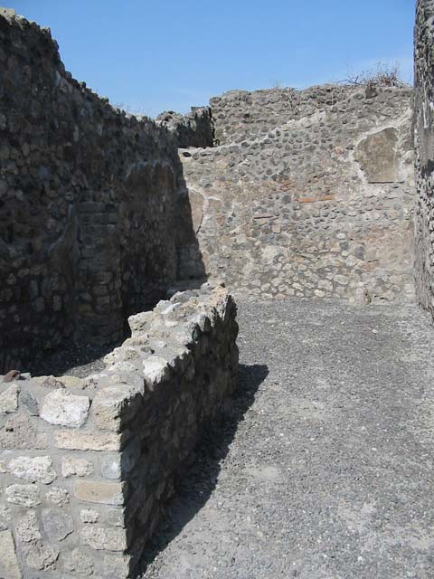 VIII.3.23 Pompeii. May 2003. East wall of rear room, with base of stairs, on left, and possibly latrine, on right. Photo courtesy of Nicolas Monteix.
