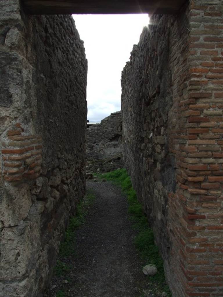 VIII.3.27 Pompeii. December 2007.  Corridor leading from peristyle area to rooms in south-east corner, comprising the kitchen and other servants’ rooms.

