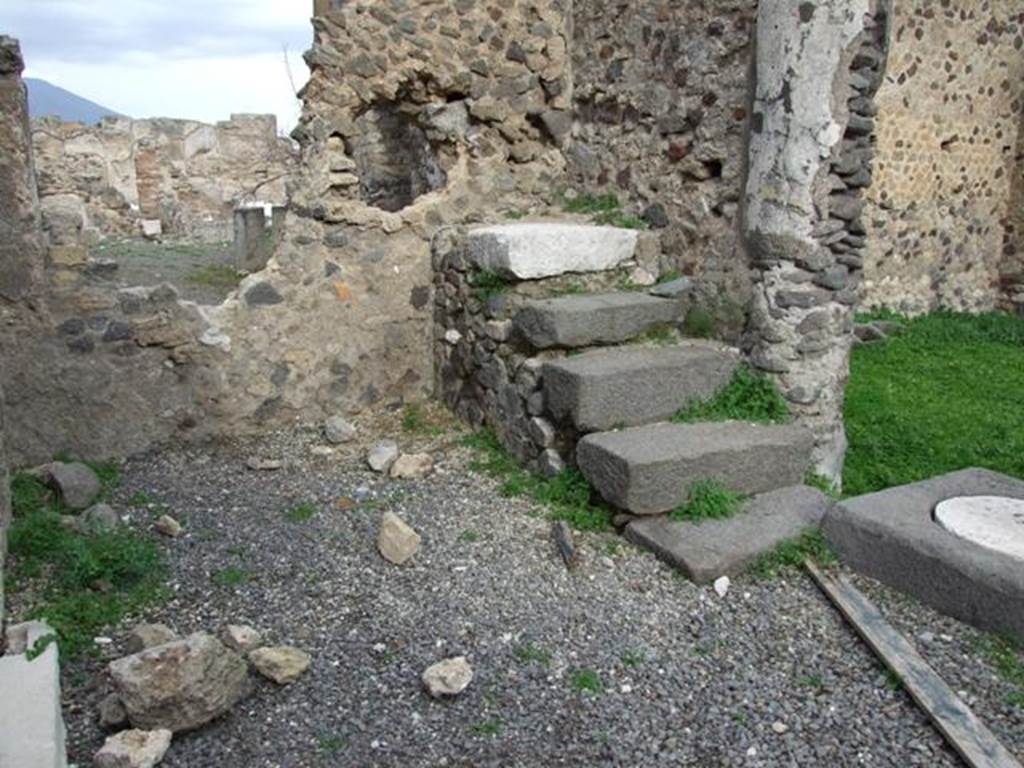 VIII.3.27 Pompeii.  December 2007.  Stone staircase to upper floor on north side of pseudoperistyle.
