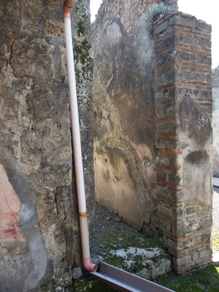 VIII.4.4 Pompeii. March 2009. Doorway to room 5, corridor, with the remains of the impression of the steps to upper floor.