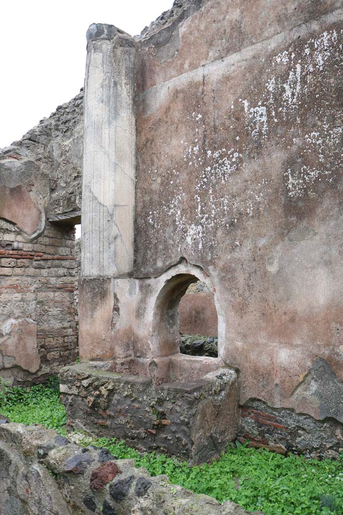 VIII.4.4, Pompeii. December 2018. 
Room 8, corridor, looking towards east side with doorway to kitchen, and basin with arched opening above. 
Photo courtesy of Aude Durand.
