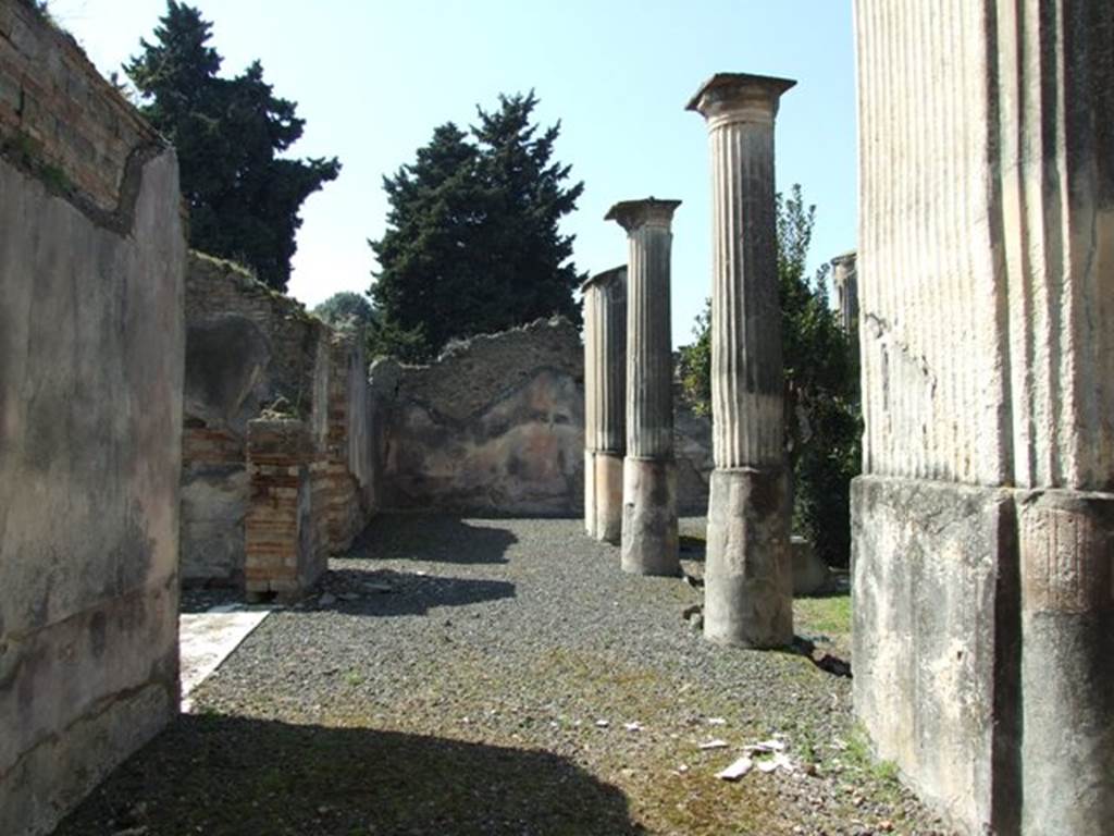 VIII.4.4 Pompeii.  March 2009.  Looking west along south portico, and with the marble sill of room 11, Exedra,  on the left.