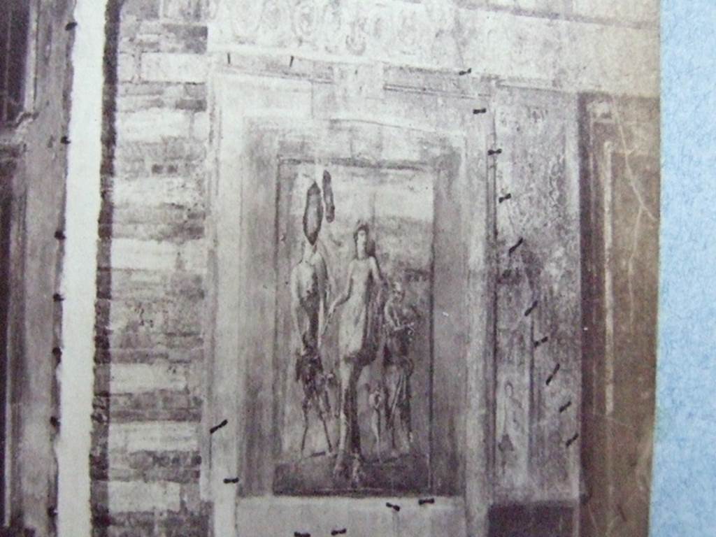 VIII.4.4 Pompeii. Room 11, east wall of exedra, detail of painting in exedra at rear of peristyle.  
Hermaphrodite has his left arm on the shoulder of Silenus who is playing the lyre with a plectrum.
Courtesy of Society of Antiquaries, Fox Collection.
