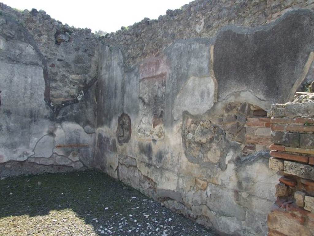 VIII.4.4 Pompeii. March 2009. Room 11, west wall of exedra.  
In the centre would have been the painting of Bacchus, sleeping Ariadne and a faun lifting up the veil that covered her. 
See Curtius, L., 1972. Die Wandmalerei Pompejis. New York: Hildesheim. (p. 313, fig 179 for Bacchus and Ariadne at Naxos) 
See Breton, Ernest. 1870. Pompeia, Guide de visite a Pompei, 3rd ed. Paris, Guerin. 
See Pappalardo, U., 2001. La Descrizione di Pompei per Giuseppe Fiorelli (1875). Napoli: Massa Editore. (p.127)