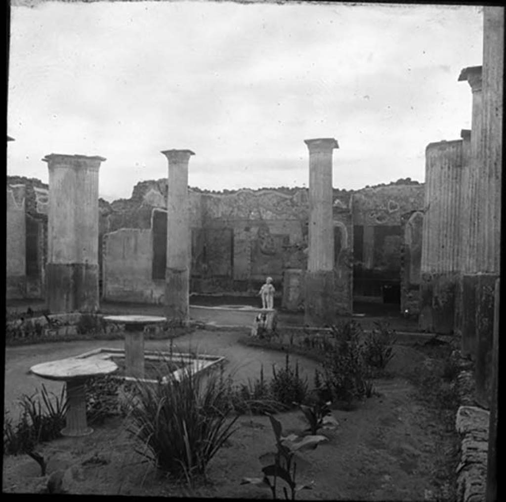 VIII.4.4 Pompeii. Looking south across garden, and showing decorated walls of rooms 11 and 12 overlooking the south portico. Photo by permission of the Institute of Archaeology, University of Oxford. File name instarchbx202im 053a. Resource ID. 44491. See photo on University of Oxford HEIR database.
