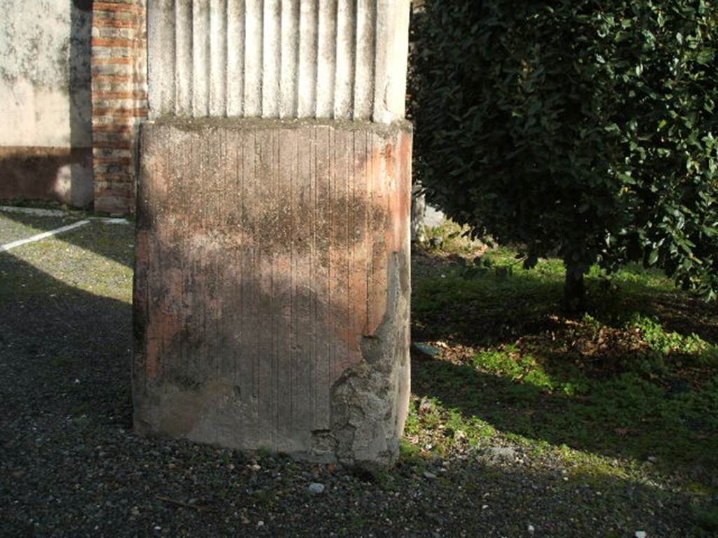 VIII.4.4 Pompeii.  December 2004.  Base of double pillar in peristyle, taken from VIII.4.49.