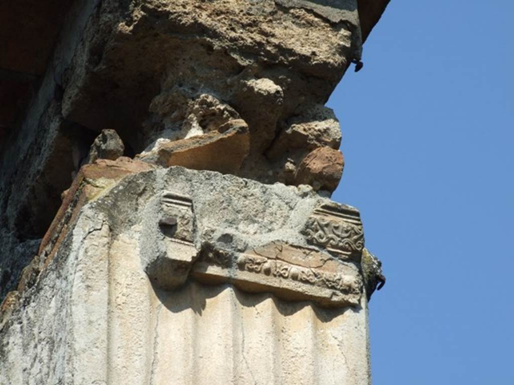 VIII.4.4 Pompeii.  March 2009.  Remains of decorated pillar in north west corner.

