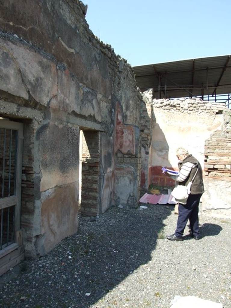 VIII.4.4 Pompeii.  March 2009.  Doorway to room 17, in north west corner of west portico.