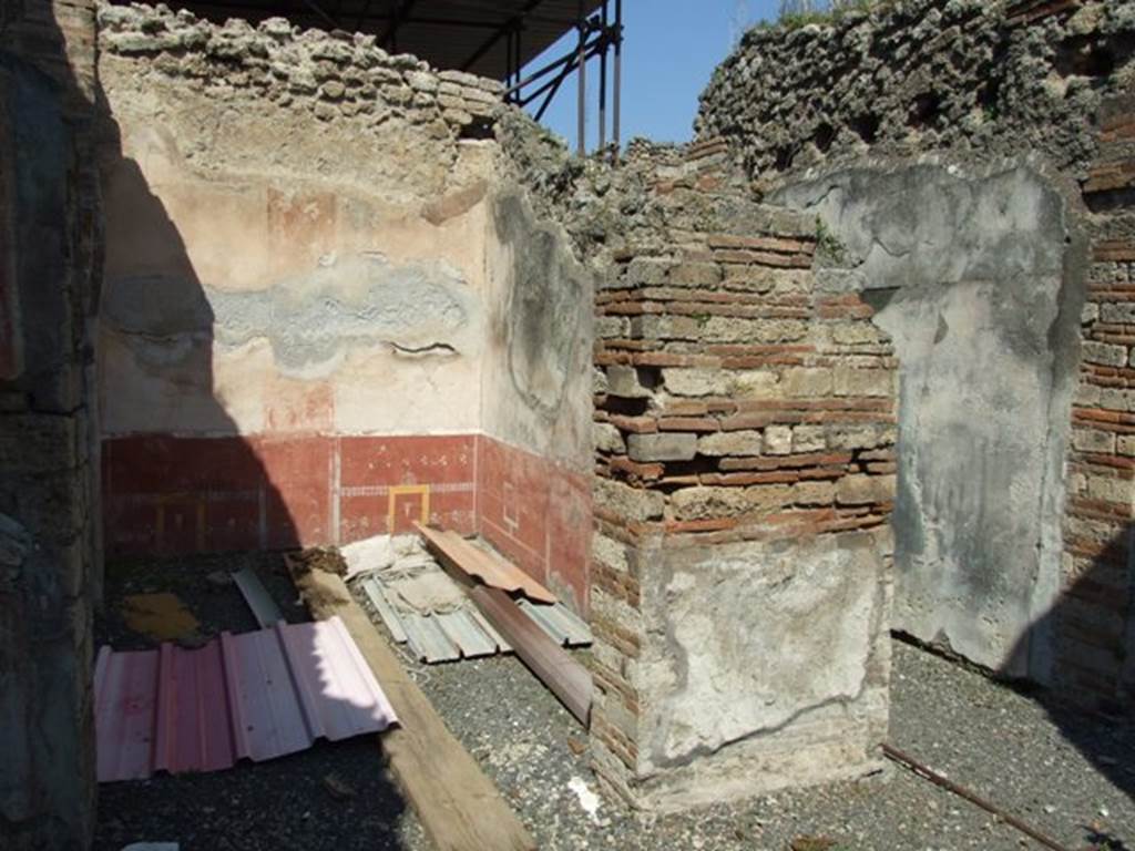 VIII.4.4 Pompeii. March 2009. North-west corner of portico, with wide entrance of room 18, oecus, and corridor room 19.