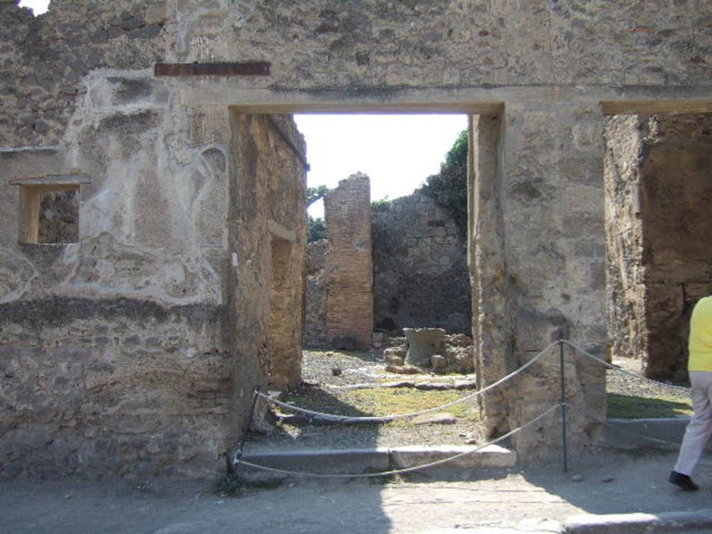 VIII.4.27 Pompeii.  September 2005. The following inscriptions, painted in red and black were found in March 1853 on the façade: 

Gavium Holconium II vir(um)
[…]iuvenes probos o(ro) v(os) f(aciatis)  [CIL IV 1007] 

[Pos]tumium aed(ilem)
Felix rog(at)  [CIL IV 1008]

Ceium II vir(um) i(ure) d(icundo) o(ro) v(os) f(aciatis)  [CIL IV 1009]

[Hol]conium Priscum II vir(um) i(ure) d(icundo)  [CIL IV 1010]

Cuspium Pansam aed(ilem)
Popidius Natalis cliens cum Isiacis rog(at)  [CIL IV 1011]

Popidium Secundum
egregium adulescentem aed(ilem) o(ro) v(os) f(aciatis)  [CIL IV 1012]

See Pagano, M. and Prisciandaro, R., 2006. Studio sulle provenienze degli oggetti rinvenuti negli scavi borbonici del regno di Napoli. Naples : Nicola Longobardi. (p.167) 
