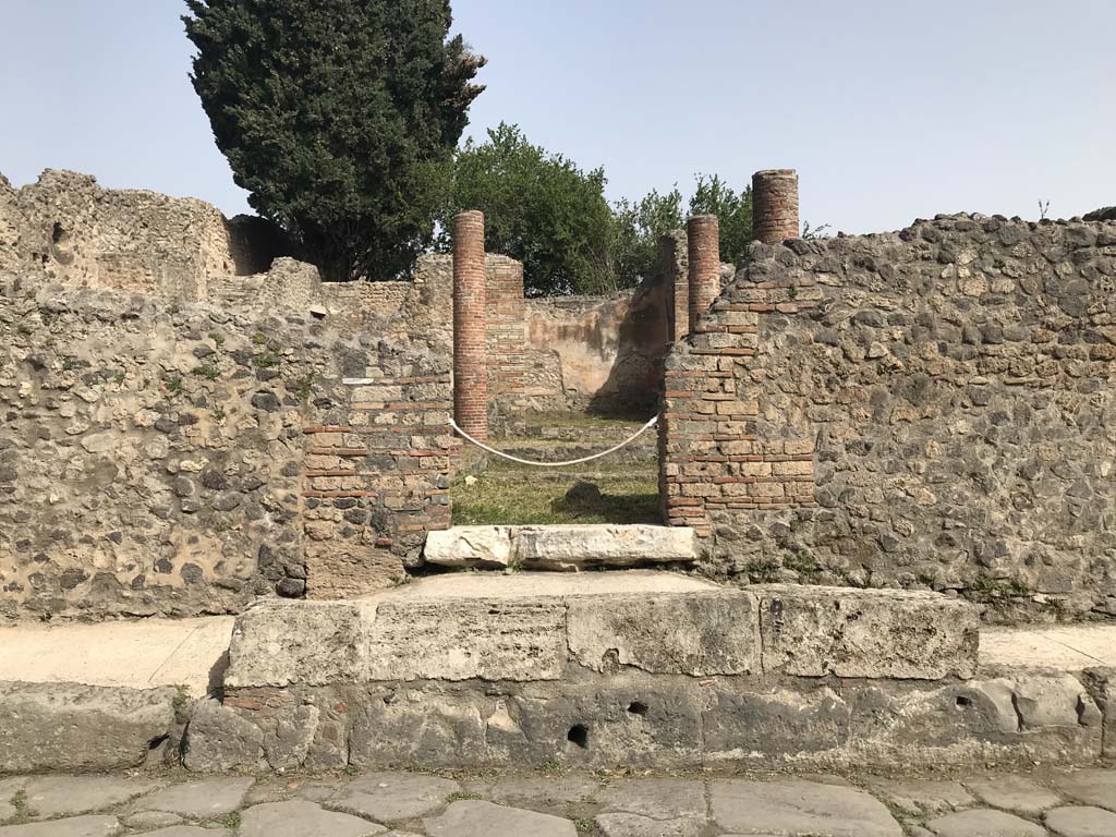 VIII.4.34 Pompeii, April 2019. Entrance doorway on raised ramp in pavement.
Photo courtesy of Rick Bauer.
