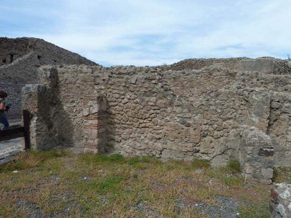 VIII.4.44 Pompeii. September 2015. North wall of shop, site of steps to upper floor.