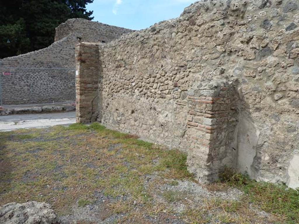 VIII.4.45 Pompeii. September 2015. Looking west along north wall of shop-room.