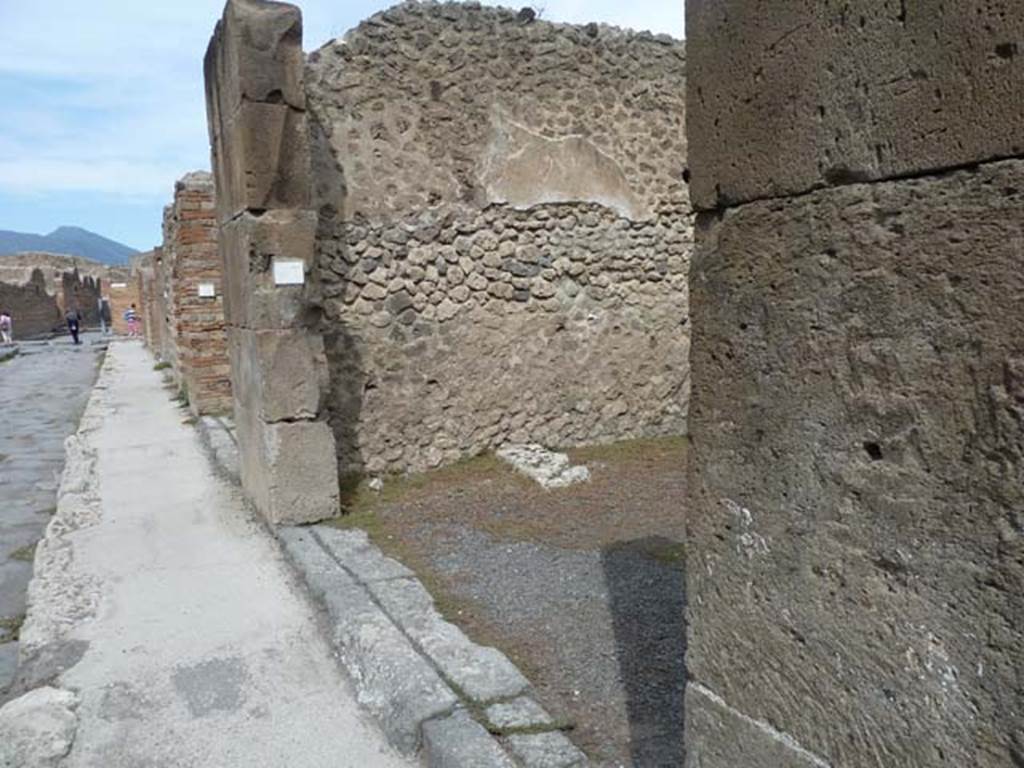 VIII.4.47 Pompeii. September 2015. Looking north to entrance doorway on east side of Via dei Teatri.