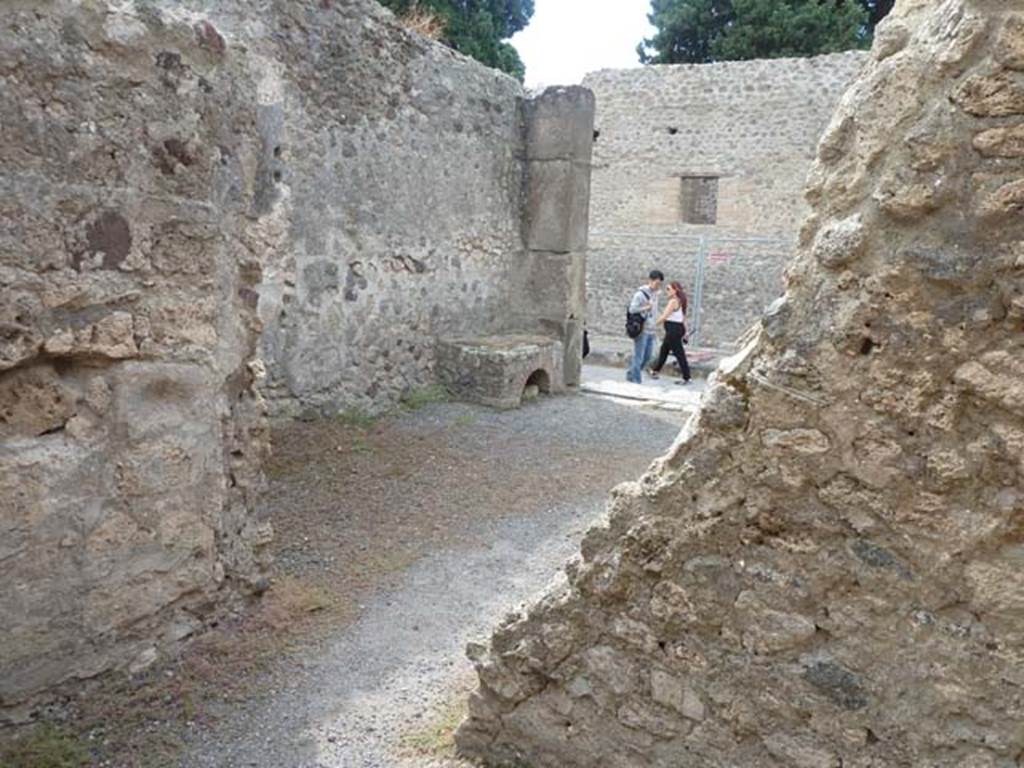 VIII.4.47 Pompeii. September 2015. West wall, with doorway, in rear room.