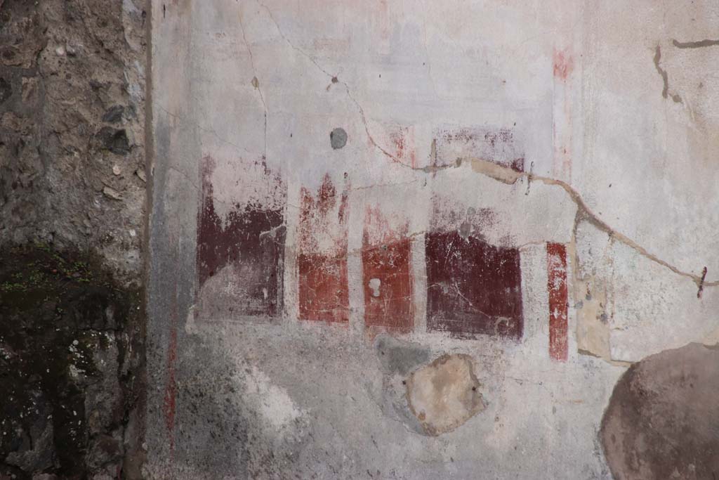 VIII.5.2 Pompeii. October 2020.  Room 8, painted plaster on the lower east end of south wall of an oecus, at rear of peristyle garden. 
Photo courtesy of Klaus Heese. 
