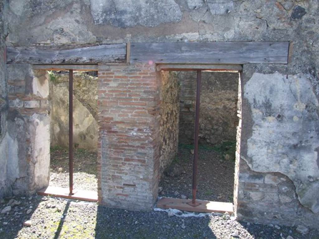 VIII.5.2 Pompeii.  March 2009.  Doorways to Rooms 12 and 9.