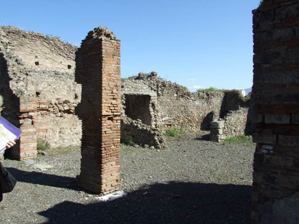 VIII.5.2 Pompeii.  March 2009.  Doorways to Room 13, Large Triclinium, and Room 16, Cubiculum.