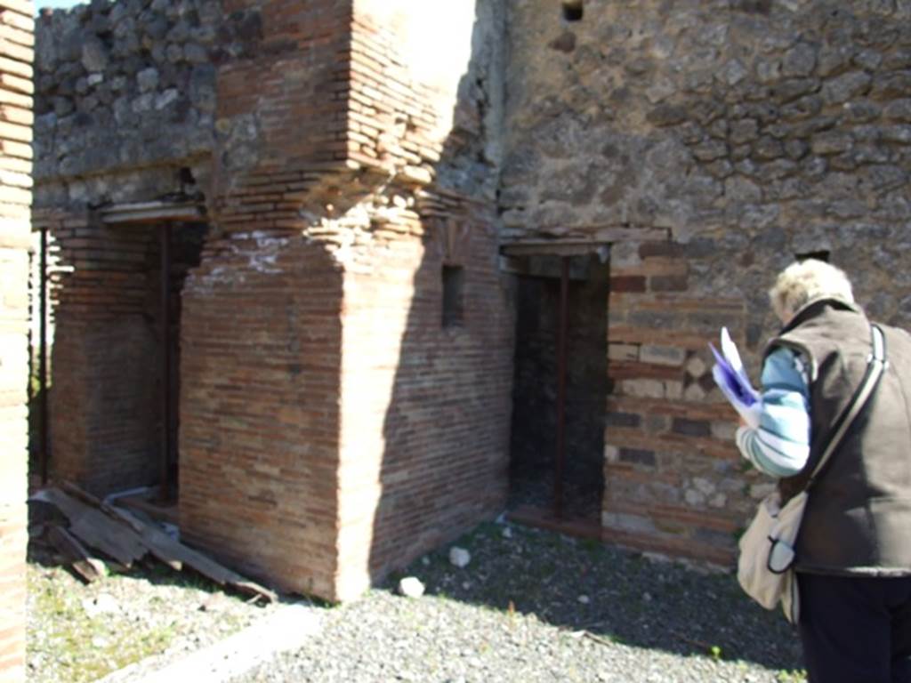 VIII.5.2 Pompeii.  March 2009.  Doorways to Rooms 21 and 19.