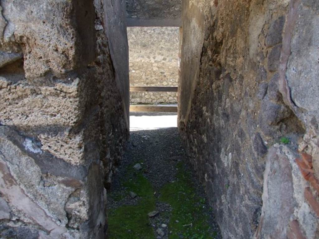 VIII.5.9 Pompeii.  March 2009.  Room 15.  Leading to VIII.5.13. Staircase from outside to upper floor.  The line of the staircase can still be seen by the plaster at the end of the corridor.