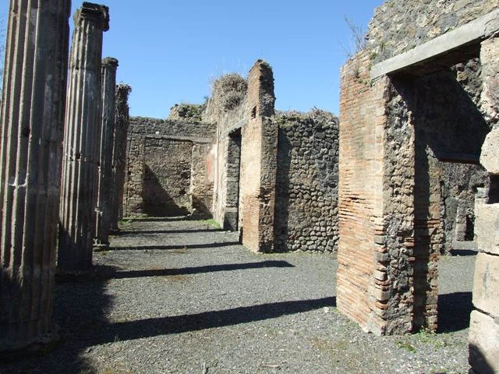 VIII.5.9 Pompeii.  March 2009. Looking west across North Portico, wrth Doorways to Rooms 7, 6 and 5.