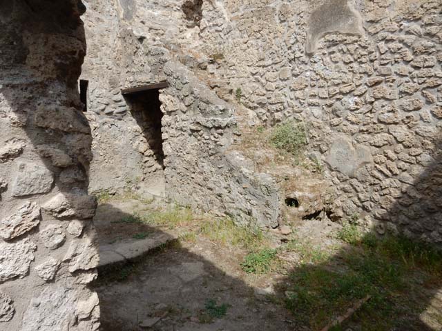 VIII.5.15 Pompeii. May 2017. Room 1, detail of remaining stairs to upper floor against north wall. Photo courtesy of Buzz Ferebee.
